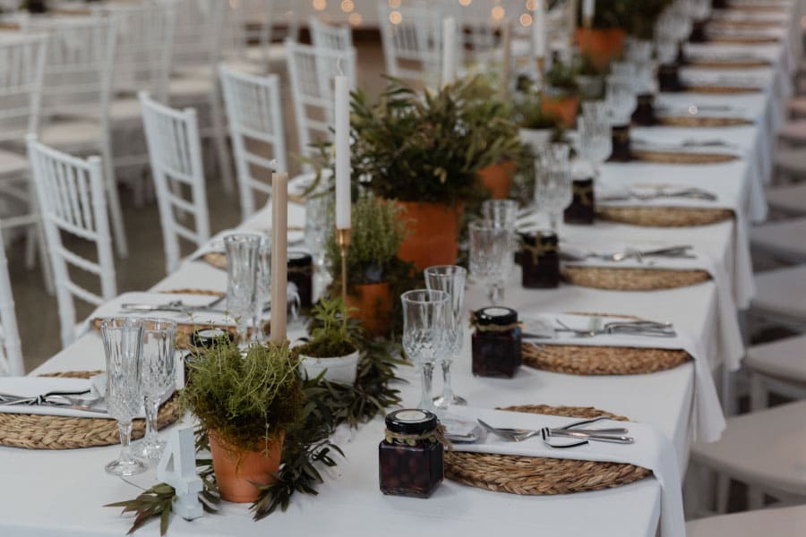 Close-up table styling with botanical centerpieces