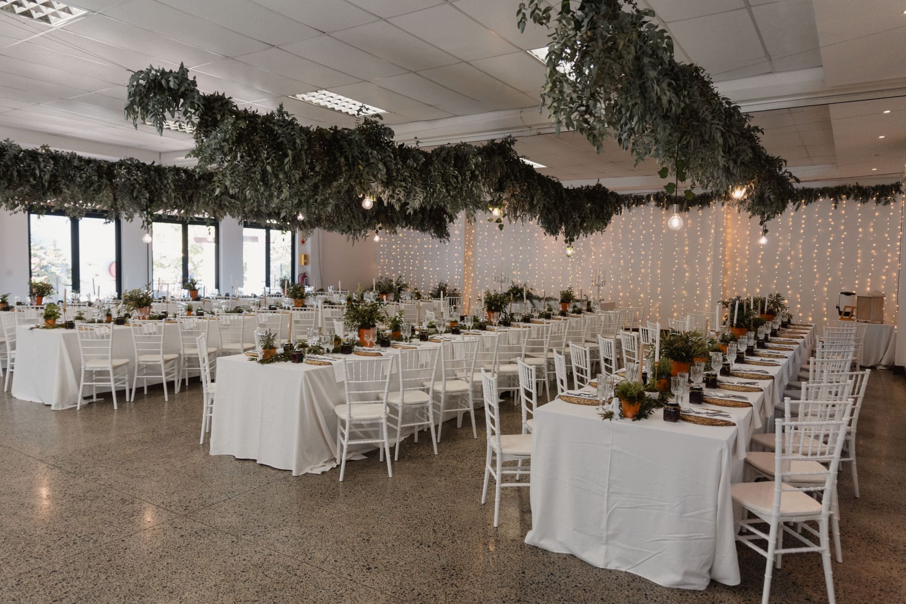 Wide view of De Wilger Hall with greenery installation